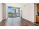 A bright living space with hardwood floors, skyline views through expansive windows and modern lighting provides comfortable urban living at 1080 Peachtree Ne St # 2515, Atlanta, GA 30309