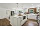 Beautiful kitchen with quartz countertops, stainless steel appliances, and a center island at 125 Roswell Farms Ln, Roswell, GA 30075