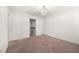 Neutral bedroom showcases soft carpet and a doorway to the stairs at 813 Ambient Sw Way, Atlanta, GA 30331