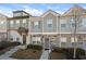 Charming townhome with stone accents, neutral siding, manicured lawn and easy to navigate front steps at 813 Ambient Sw Way, Atlanta, GA 30331