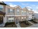 Inviting townhome with stone and siding exterior and well maintained lawn at 813 Ambient Sw Way, Atlanta, GA 30331