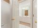 Bathroom with a shower-tub combo and an adjacent white vanity at 891 Berryman Pl, Lawrenceville, GA 30045