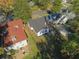 Aerial view showing the property's landscaping, neighboring houses, and street access at 1384 Allegheny Sw St, Atlanta, GA 30310