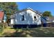 The backyard with a well-manicured lawn offers plenty of space for outdoor activities and relaxation at 1384 Allegheny Sw St, Atlanta, GA 30310