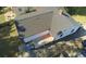 Aerial view of backyard features a deck, green space, and side driveway at 1384 Allegheny Sw St, Atlanta, GA 30310