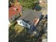 Aerial view of backyard features a wooden deck, green space, and side driveway at 1384 Allegheny Sw St, Atlanta, GA 30310