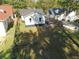 Aerial view of backyard, manicured lawn, fencing, and access to driveway at 1384 Allegheny Sw St, Atlanta, GA 30310