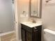 Updated bathroom featuring a single sink vanity and modern fixtures at 1384 Allegheny Sw St, Atlanta, GA 30310