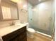 Remodeled bathroom with shower, single sink vanity, and modern fixtures at 1384 Allegheny Sw St, Atlanta, GA 30310