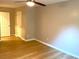 Bedroom with hardwood floors, neutral walls, and white trim at 1384 Allegheny Sw St, Atlanta, GA 30310