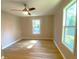 Bedroom with windows allowing natural light, ceiling fan, and neutral paint at 1384 Allegheny Sw St, Atlanta, GA 30310