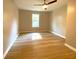Spacious bedroom featuring hardwood floors, neutral paint and ceiling fan at 1384 Allegheny Sw St, Atlanta, GA 30310
