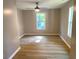 Bedroom with hardwood floors and natural light coming through the windows at 1384 Allegheny Sw St, Atlanta, GA 30310