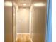 Hallway with hardwood floors and neutral paint at 1384 Allegheny Sw St, Atlanta, GA 30310