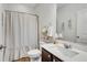 Bathroom featuring a vanity, toilet, and a shower with a curtain at 4410 Chaney Ct, Cumming, GA 30028