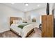 Bedroom featuring a neutral color palette, a bed, and a window at 4410 Chaney Ct, Cumming, GA 30028