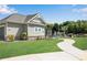 Community clubhouse and pool area with walking path and manicured landscaping at 4410 Chaney Ct, Cumming, GA 30028