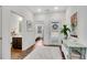 Open foyer with hardwood floors, leading to bright and airy rooms at 4410 Chaney Ct, Cumming, GA 30028