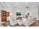 Inviting living room featuring recessed lighting, hardwood floors, and comfortable seating at 4410 Chaney Ct, Cumming, GA 30028