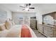 Main bedroom with hardwood floors, lots of natural light, and a ceiling fan at 4410 Chaney Ct, Cumming, GA 30028