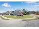 Large corner lot featuring a well-manicured lawn and mature trees at 4410 Chaney Ct, Cumming, GA 30028