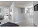 Open loft with neutral carpet, stylish decor, and ample natural light at 6170 Weddington Dr, Cumming, GA 30040
