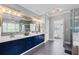 Primary bathroom features a double vanity, large mirror, and glass shower with designer tile at 65 Maude White Rd, Kingston, GA 30145