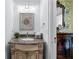 Charming bathroom showcasing a granite countertop vanity, decorative mirror, and vintage-style accents at 65 Maude White Rd, Kingston, GA 30145