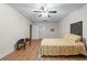 Relaxing bedroom with laminate flooring, a comfortable bed, and a soothing ambiance at 65 Maude White Rd, Kingston, GA 30145