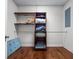 Organized walk-in closet with shelving and hanging rods for ample storage at 65 Maude White Rd, Kingston, GA 30145