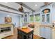 Gourmet kitchen featuring a farmhouse sink, custom cabinets, and a center island at 65 Maude White Rd, Kingston, GA 30145