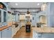 Gourmet kitchen with custom cabinets, hardwood floors, stainless steel appliances, and ample counter space at 65 Maude White Rd, Kingston, GA 30145