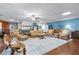 Bright living room with a cozy seating arrangement, a decorative rug, and charming decor at 65 Maude White Rd, Kingston, GA 30145