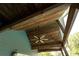 Close up of the rustic wood ceiling with fan of an outdoor porch, providing shade and airflow at 65 Maude White Rd, Kingston, GA 30145