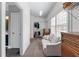 Spacious walk-in closet with window, seating and custom shelving offers ample storage at 65 Maude White Rd, Kingston, GA 30145