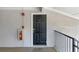 Exterior view of front door of unit K-18, with fire extinguisher at 1150 Collier Nw Rd # K18, Atlanta, GA 30318