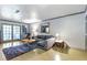 Well-lit living room features neutral walls, hardwood floors, with cozy seating arrangement at 1150 Collier Nw Rd # K18, Atlanta, GA 30318