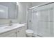 Modern bathroom featuring a glass shower door at 2919 Camplay Dr, Suwanee, GA 30024