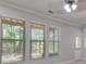 Window-filled bedroom boasting ample natural light at 2919 Camplay Dr, Suwanee, GA 30024