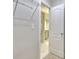 Walk-in closet with an open doorway into the connected bathroom at 2919 Camplay Dr, Suwanee, GA 30024