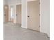 Spacious bedroom with multiple doors showcasing great layout with natural light at 3390 Hillshire Dr, Cumming, GA 30028
