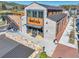 Brick commercial building with outdoor dining and rooftop bar with modern architectural details at 3390 Hillshire Dr, Cumming, GA 30028