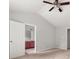 Bright bedroom with ceiling fan and entry to bathroom with dark cabinets at 145 Redsage Rdg, Atlanta, GA 30349