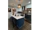 Modern kitchen featuring pendant lighting, stainless steel appliances, and an island at 2874 Cloverleaf Se Dr, Atlanta, GA 30316