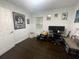 Functional office area with a desk and a sports poster at 2874 Cloverleaf Se Dr, Atlanta, GA 30316