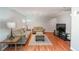 Finished basement living room with couches and TV on a laminate floor at 4540 Saddle Se Ct, Smyrna, GA 30082