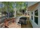 Hot tub on deck overlooking the manicured backyard with trees and privacy at 4540 Saddle Se Ct, Smyrna, GA 30082