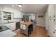 Bright kitchen with white cabinetry, stainless steel appliances, and hardwood floors at 4540 Saddle Se Ct, Smyrna, GA 30082