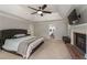 Large main bedroom with fireplace, trey ceiling and ample space at 4540 Saddle Se Ct, Smyrna, GA 30082