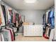 Spacious walk-in closet with ample hanging space and built-in drawers for storage at 4540 Saddle Se Ct, Smyrna, GA 30082